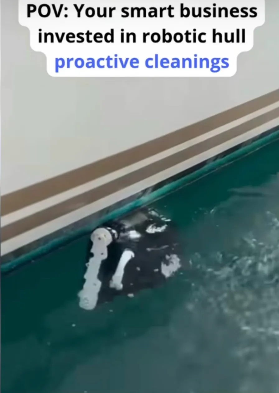 Robotic cleaner operating along the side of a boat