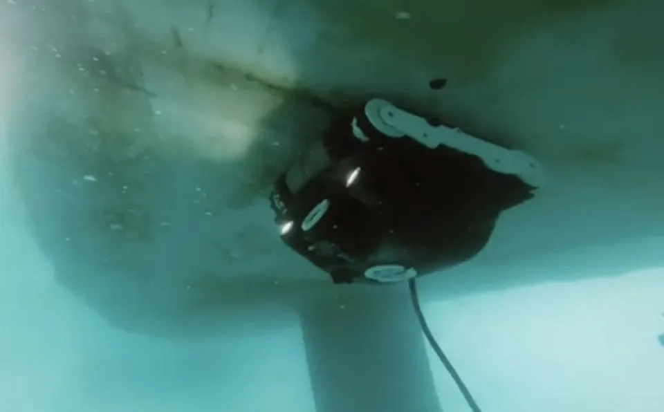 Underwater hull-cleaning robot on a boat hull